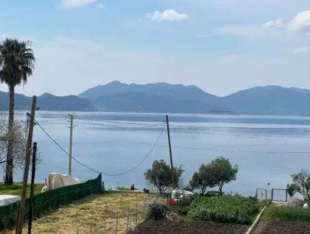 Einfamilienhaus Zum Verkauf Auf Einem 2000M2 Großen Grundstück Am Meer Im Viertel Marmaris Söğüt. Geeignet Zum Festbinden Eines Bootes Davor.